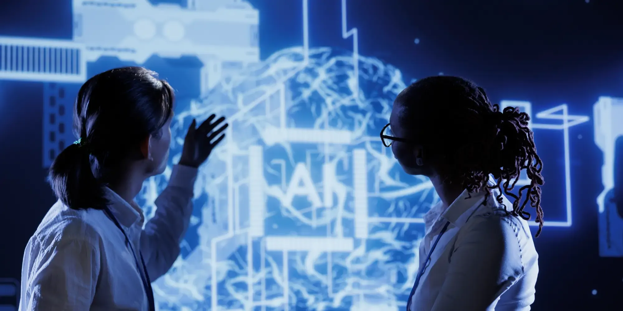 Professional coworkers developing AI machine learning models and neural networks to enhance workplace productivity and data predictions.