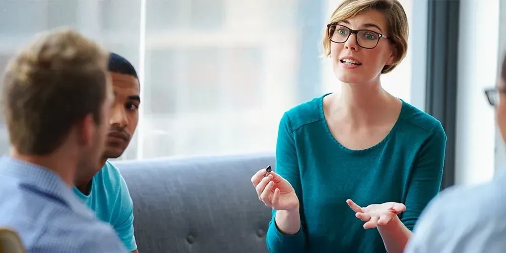 An employee talking about why TaskUs is known for its digital transformation services